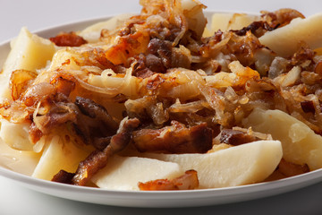 Fried potatoes with onion and bacon