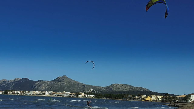 Two Kite Surfers In Pollenca Bay, Majorca Island