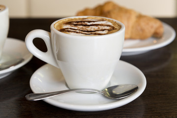 Cappuccino and croissant