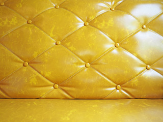 Close up of yellow sofa