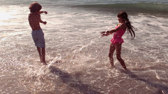 Cute children having fun with water