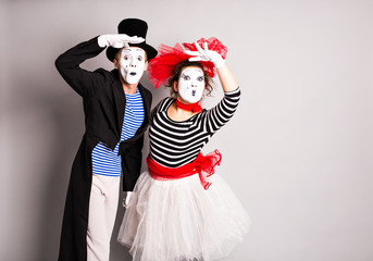 Street artists performing, Two mimes man and  woman in  April Fools Day