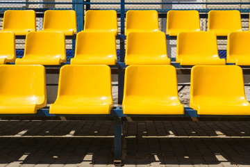 yellow seat mats for viewing of actions