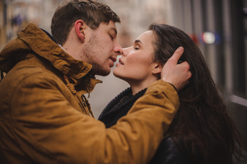 Young couple in love kissing outdoor