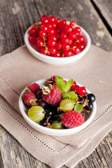 Assorted fresh berries, close up, vertical