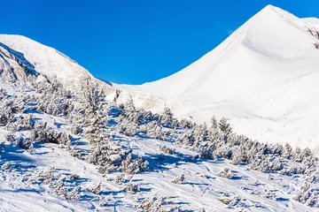 Fotobehang snow-capped mountains © dbrus