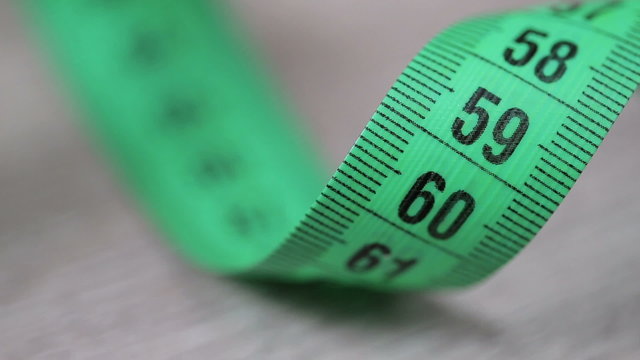 close uo green measuring tape 