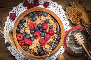 Tasty breakfast with cereal and frut.
