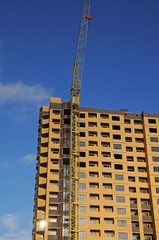 Fototapeta na wymiar The construction of high-rise buildings