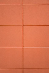 Fototapeta premium vibrant orange plaster wall texture abstract textured background