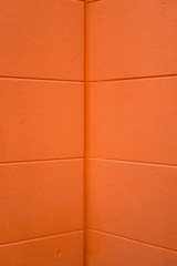 Fototapeta premium vibrant orange plaster wall texture abstract textured background