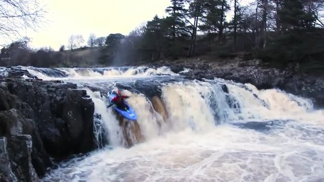 Extreme kayaking in River Tees, Low Force, UK