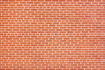 Bright red brick wall background texture