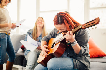 Home band learning new song together