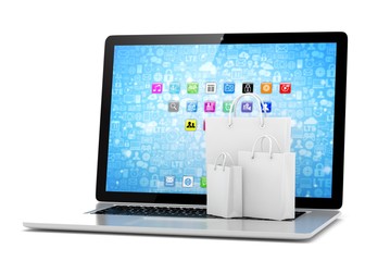 Fototapeta premium laptop and shopping pags on white background