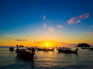 Fototapeta premium Tropical Island sunset with beach and boat