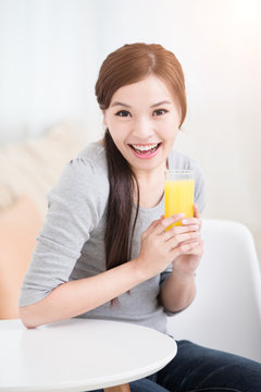 woman hold orange juice