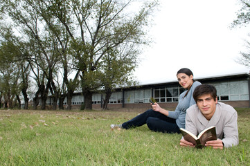 Couple lying on the grass