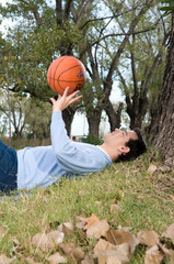 Man relaxed lying on the grass
