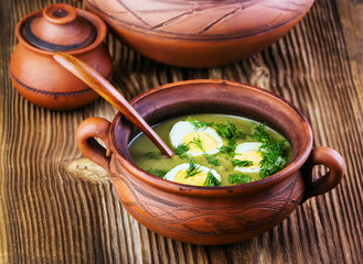 green soup-cream with egg
