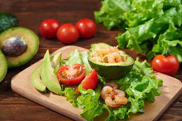 avocado salad on a wooden background