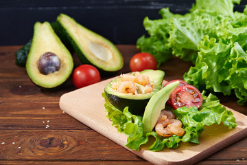 avocado salad on a wooden background