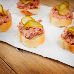 Fresh homemade fingerfood with pate and pickles