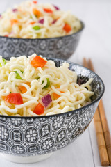 Noodles and vegetables in a bowl
