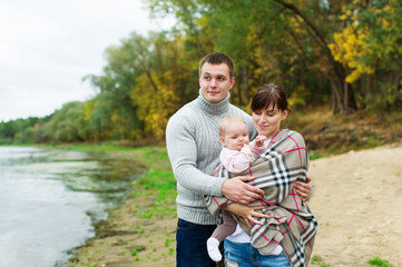 Happy family - on vacation in park