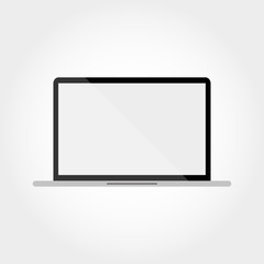 Laptop on a gray background with a white circle inside