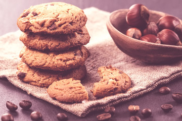 Chocolate chips cookies on black background. Vintage