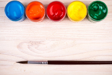 Various color paints with brush
