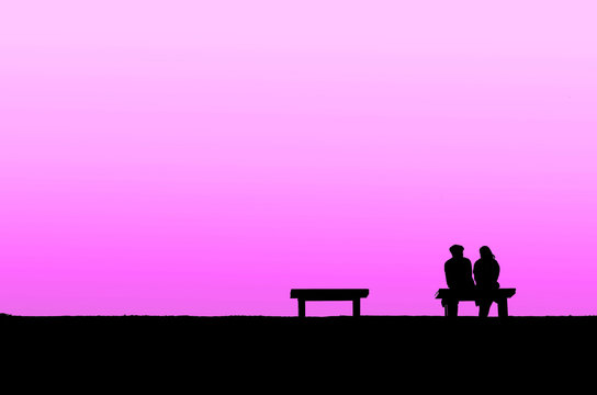 The silhouette of couple with pink background, concept of world of love, valentine, falling in love