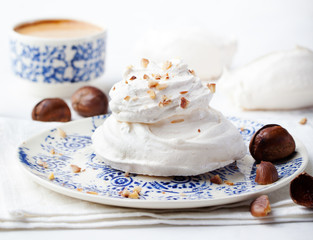 Meringue pavlova cake with chestnut cream White background
