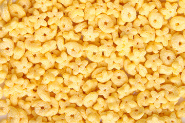 cereal beige color in the form of rings and stars