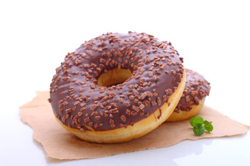 donuts with chocolate icing on a white background