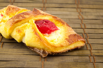 Tasty and fresh cookies on wooden background
