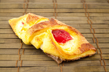Delicious cake on wooden background