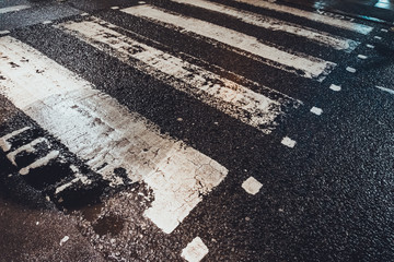 Painted Cross Walk Markings on Wet City Street