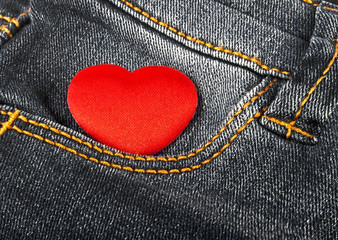 Red heart in jeans pocket