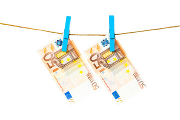 Euro notes on clothesline.  Money laundering euros