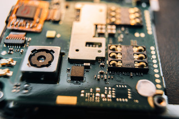Repair smartphone. Disassembled parts on a smartphone. Close-up.