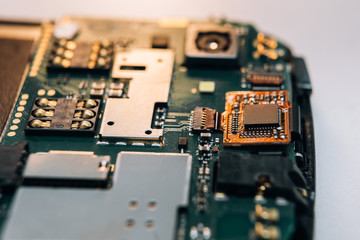 Repair smartphone. Disassembled parts on a smartphone. Close-up.