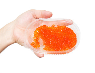 red caviar in his hand on a white background