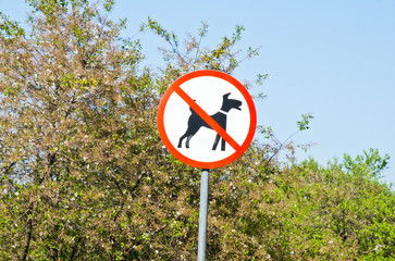 sign denied dog walking on sky background