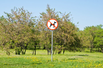 sign denied dog walking in sunny park