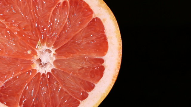 Halved healthy grapefruit. Macro shot.
