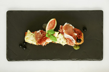 fig and cured ham bruschetta © neillangan