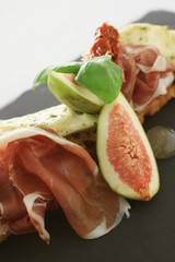 fig and cured ham bruschetta © neillangan