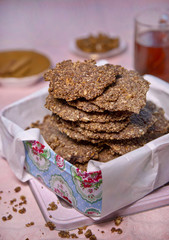 Cinnamon biscuits served in colorful metal box